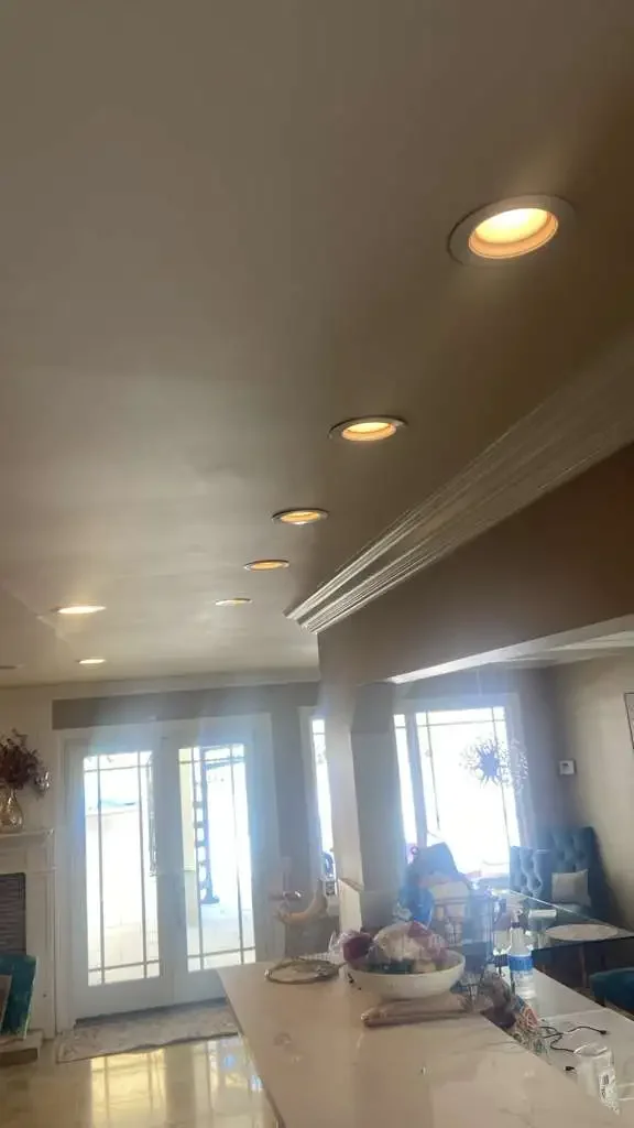 Recessed lighting installed in a residential kitchen ceiling